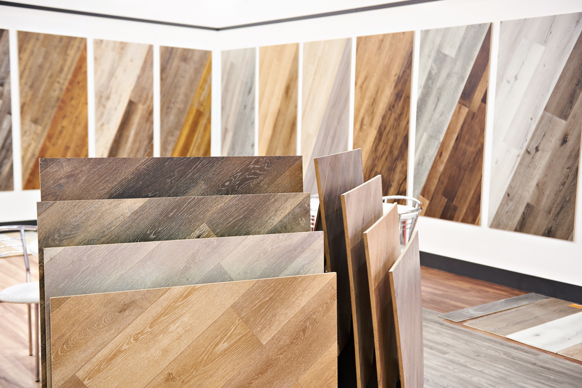 Woodgrain and marquetry wall panel samples in a showroom